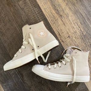 Tan high top converse